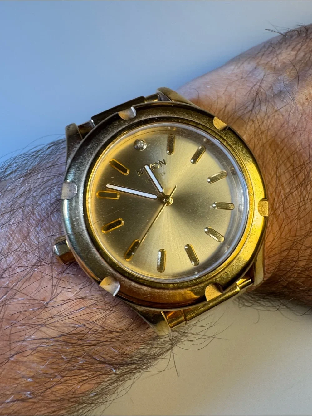 Nixon “High Maintenance” The Camden gold-tone watch w/ real diamond marker.